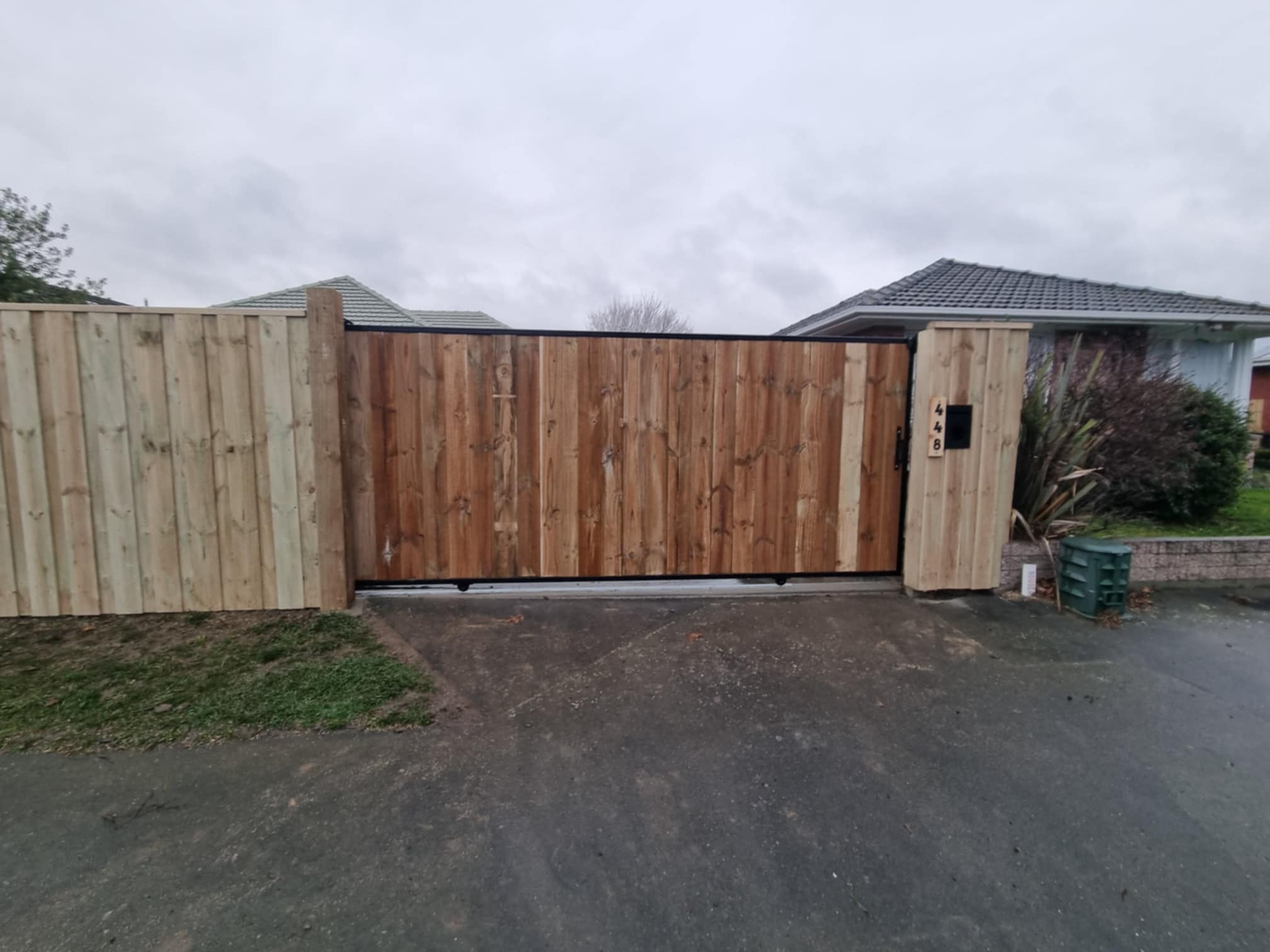 Wolf Fencing custom timber sliding gate